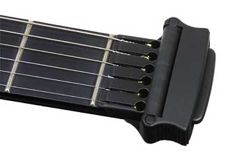 Capo stored above the zero fret.